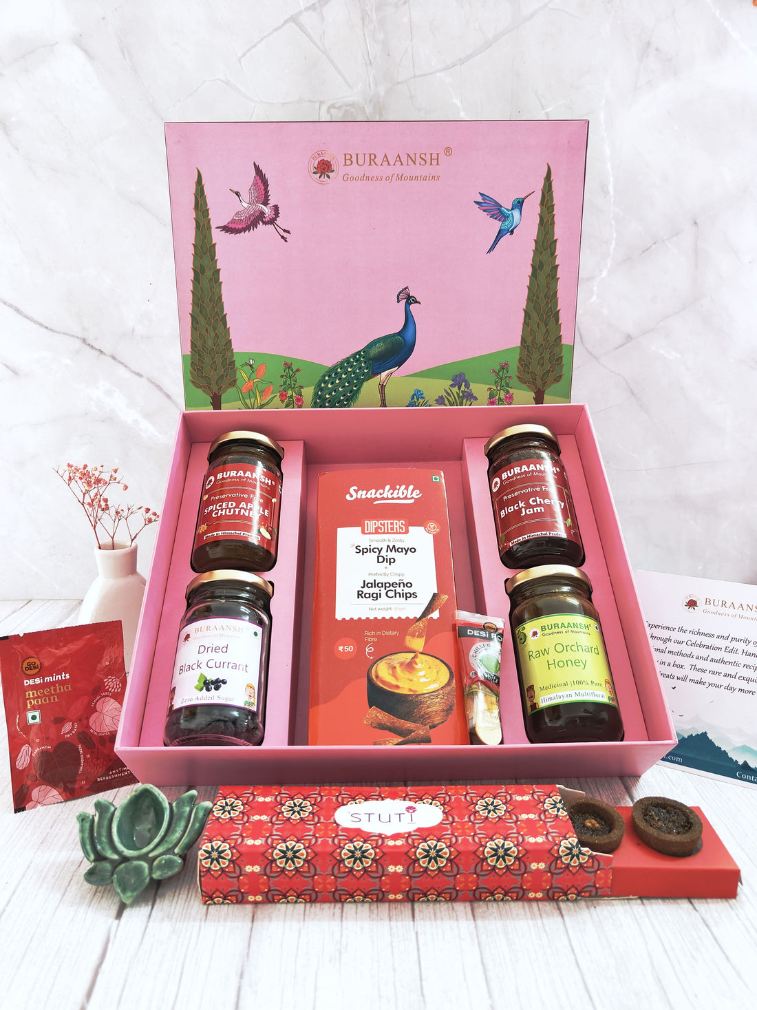 An assorted gift box of food products packed in a stunning luxurious gift box