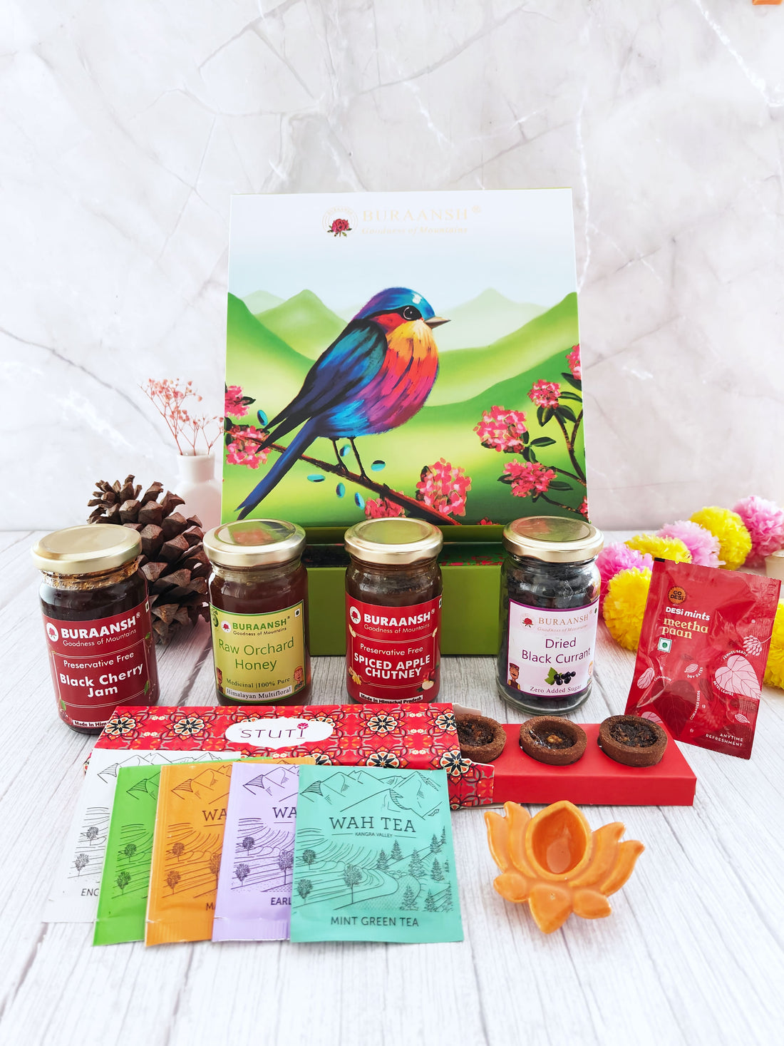 Assorted healthy natural food products packed in a beautiful colorful bird&