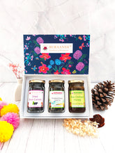 Beautiful Floral Diwali Festive Gift Box with Dried Black Currants, Himalayan Kangra Green Tea and Raw Orchard Honey in a glass bottle. 